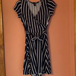 Black dress with white stripes.